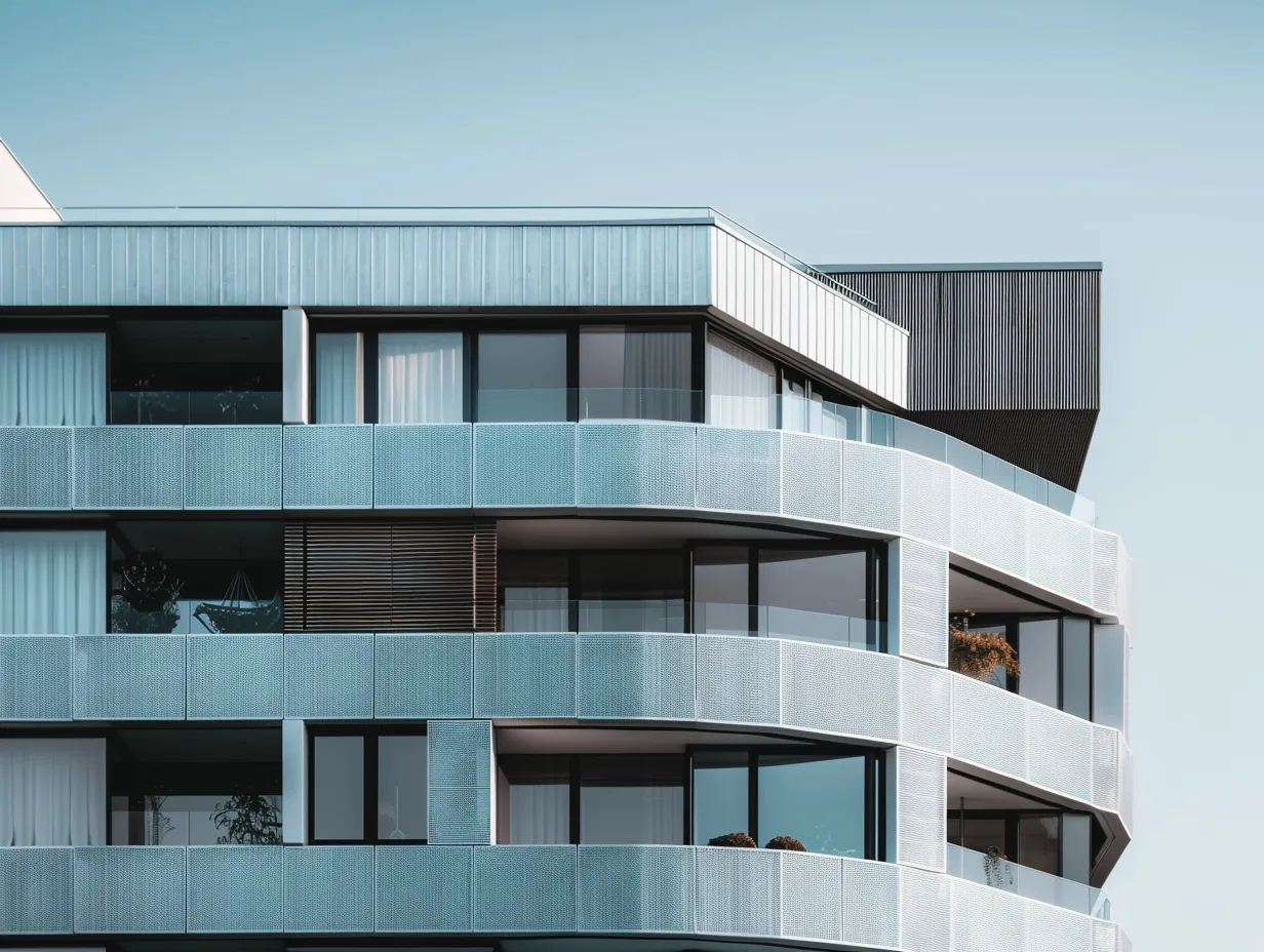 iqarat24_A_modern_apartment_building_with_large_windows_bal_b74f42fb-157b-4a8b-8b48-ba315589c7c0_0